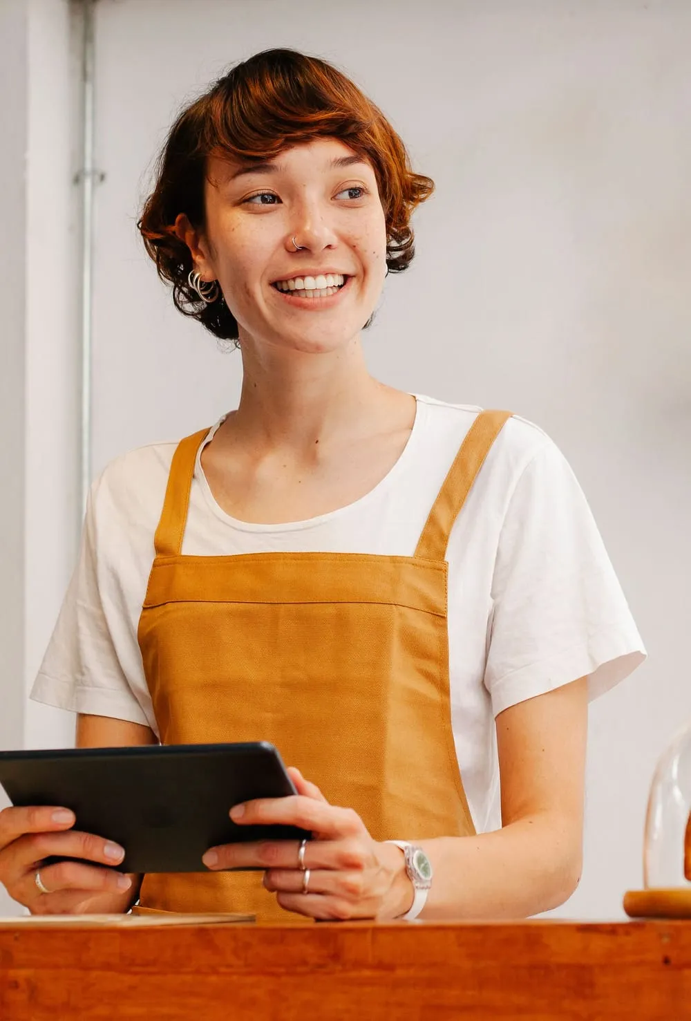 A placed temp worker checking her next shift on a tablet.